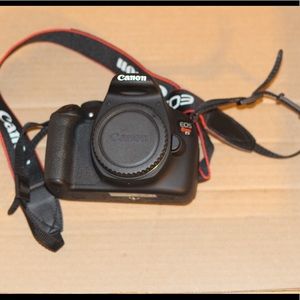 Canon T5 Camera (Body), Charger and 2 batteries.